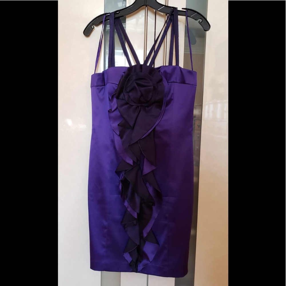 Elegant body hugging cocktail dress.